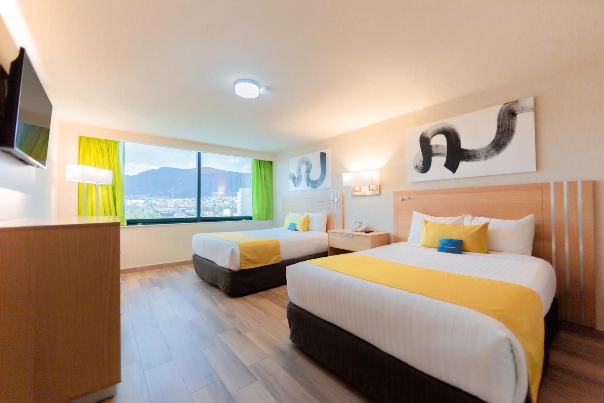 Отель La Joya Pachuca Экстерьер фото A room at the hotel